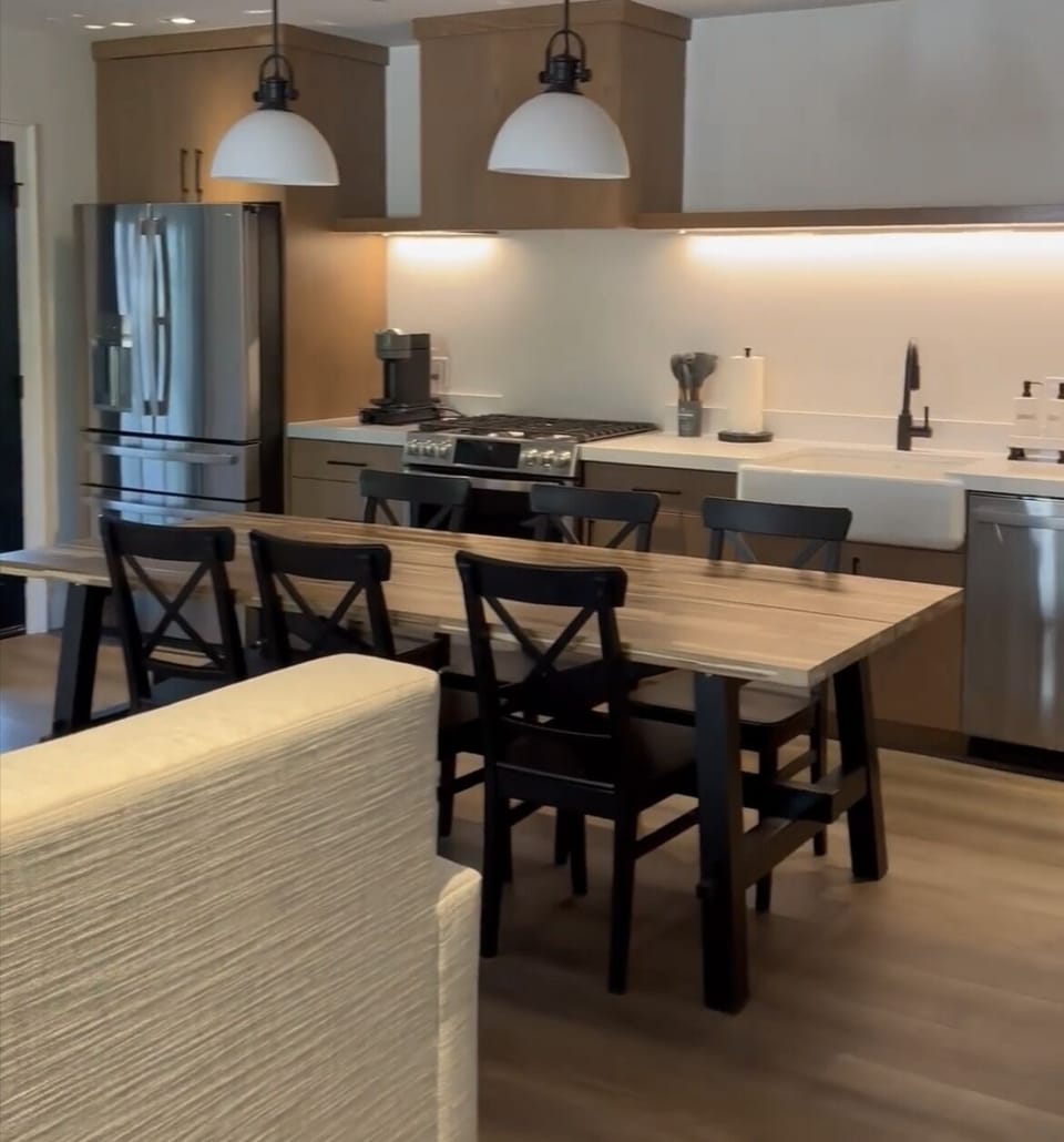 Cook together under warm pendants with plenty of counter space.