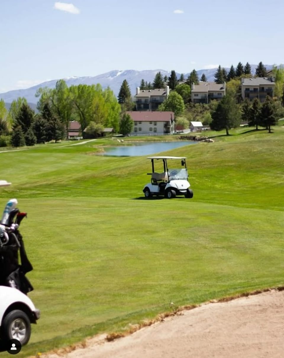 Tee off nearby with sweeping greens and mountain views