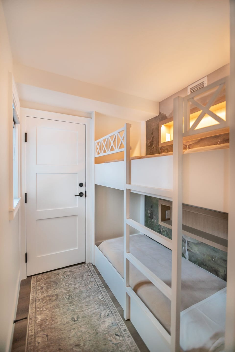 Tuck the kids in on cozy built-in bunks after adventures.