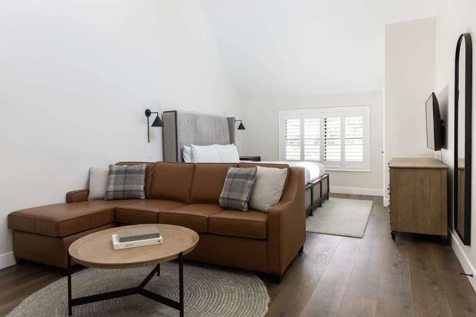 Spread out in a bright suite with lounge seating and space.