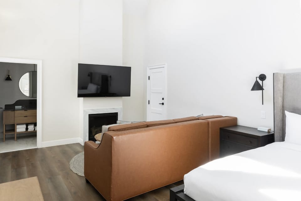 Relax by the fireplace and stream favorites from bed.