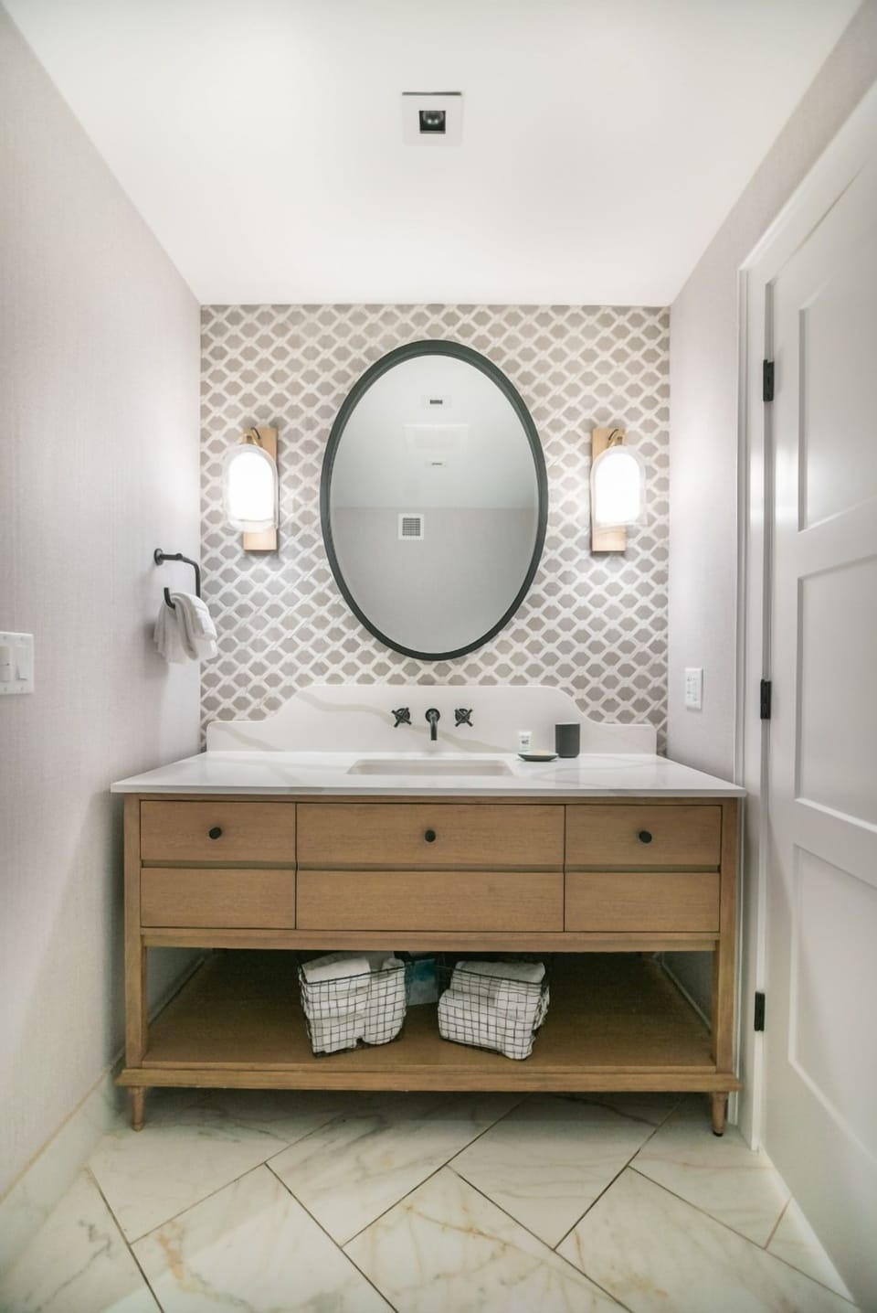 Start your day at a bright vanity with stylish lighting.