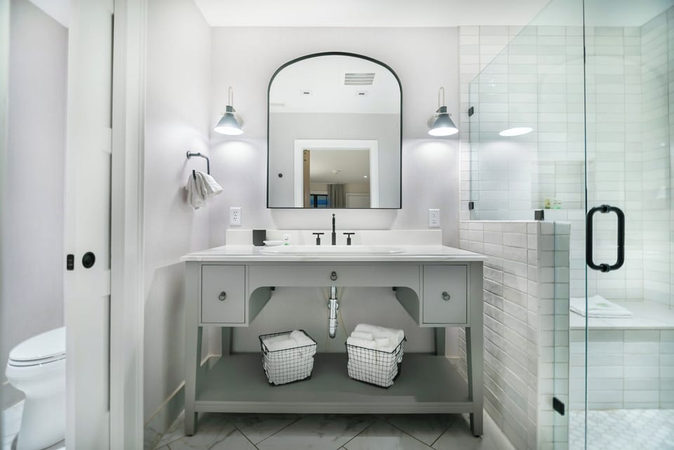 Unwind with spa-like lighting and a roomy double vanity.