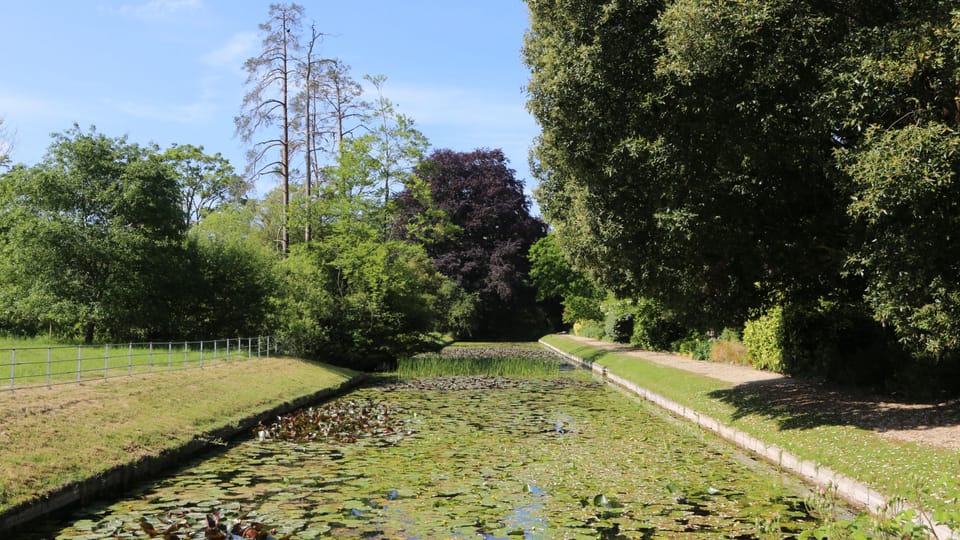 Stretching before you in the garden is the ornamental Dutch canal