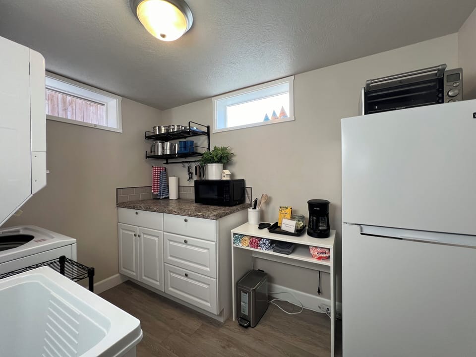 Lower level kitchenette with a hotplate, microwave, and more!