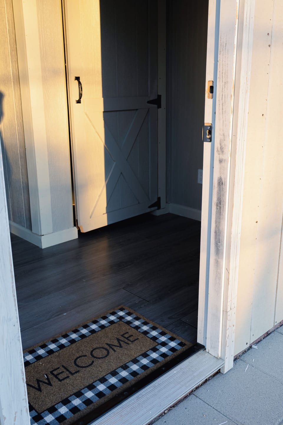 Bathroom one with 2 stalls and a sink