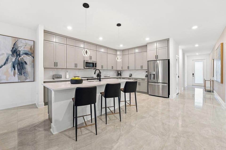 Cook with ease in the bright chef-style kitchen.
