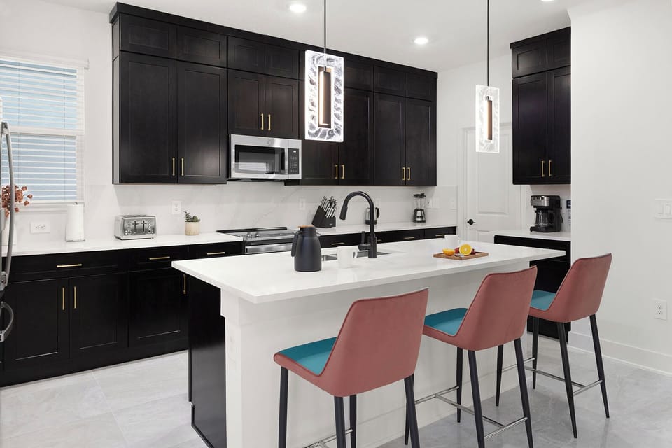 Pour morning coffee and prep brunch in this polished kitchen.