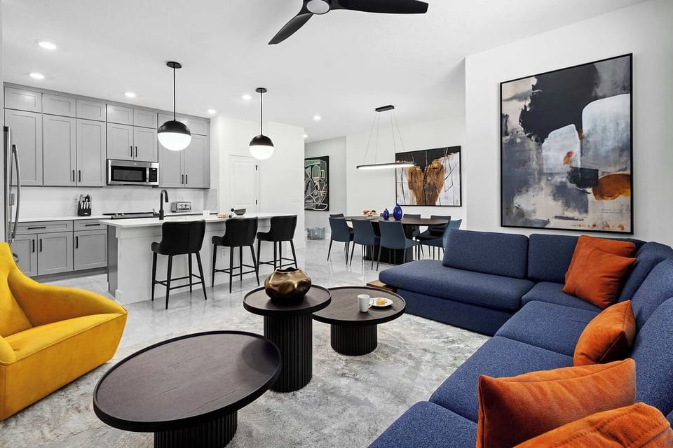 Entertain effortlessly with seamless flow from sofa to dining.