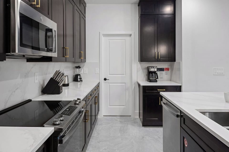 Savor easy meals with sleek counters and premium appliances.