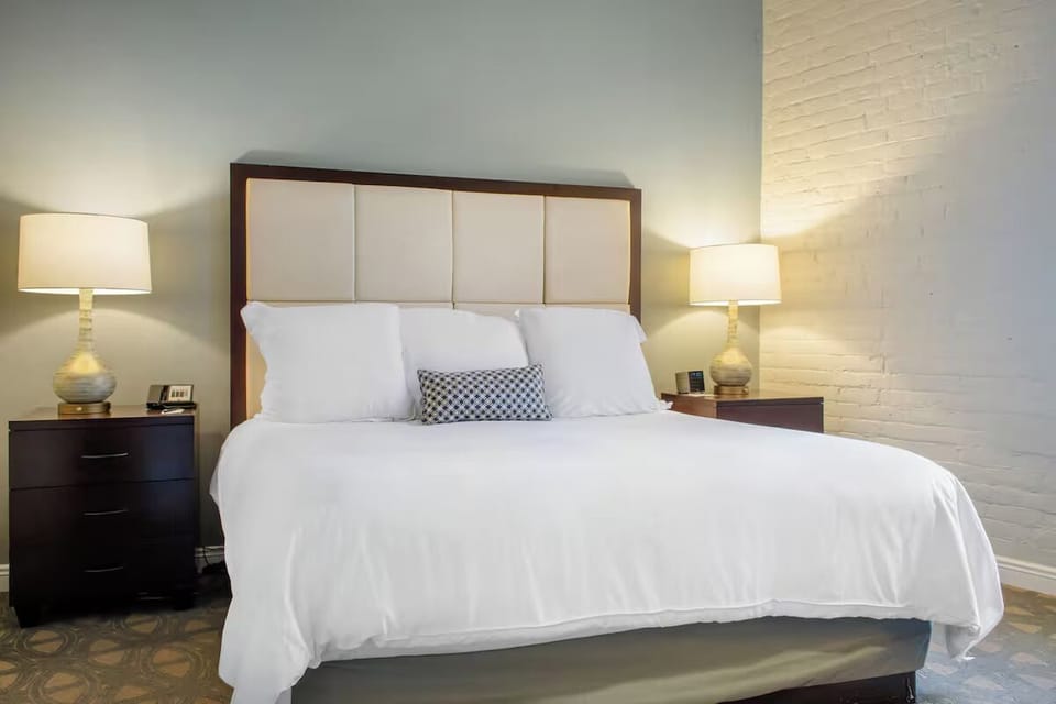 Sink into crisp bedding for a calm, restorative night’s sleep.