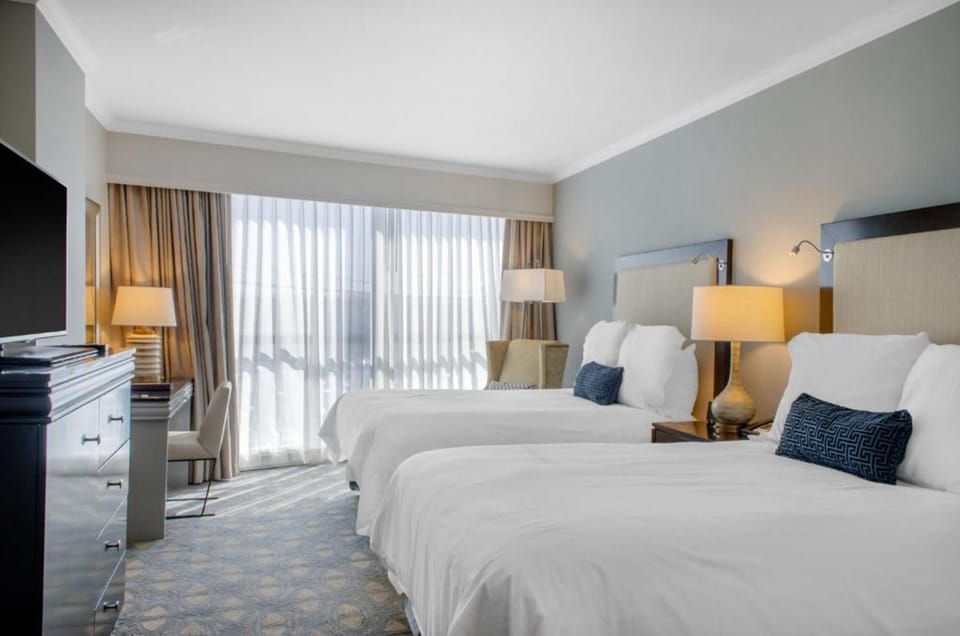 Wake up to bright daylight streaming across plush beds.