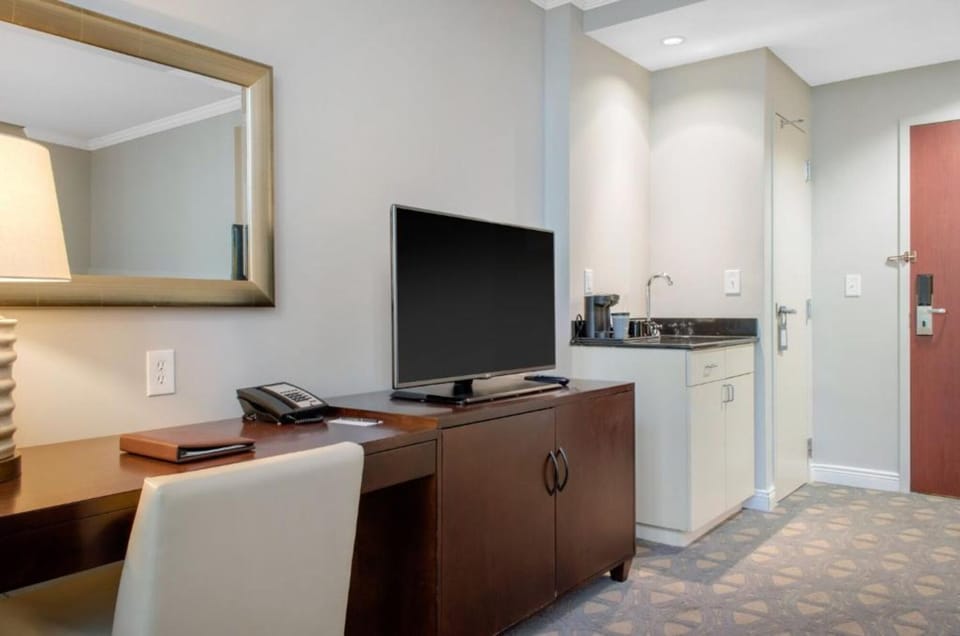 Sip morning coffee easily with your convenient in-room kitchenette.