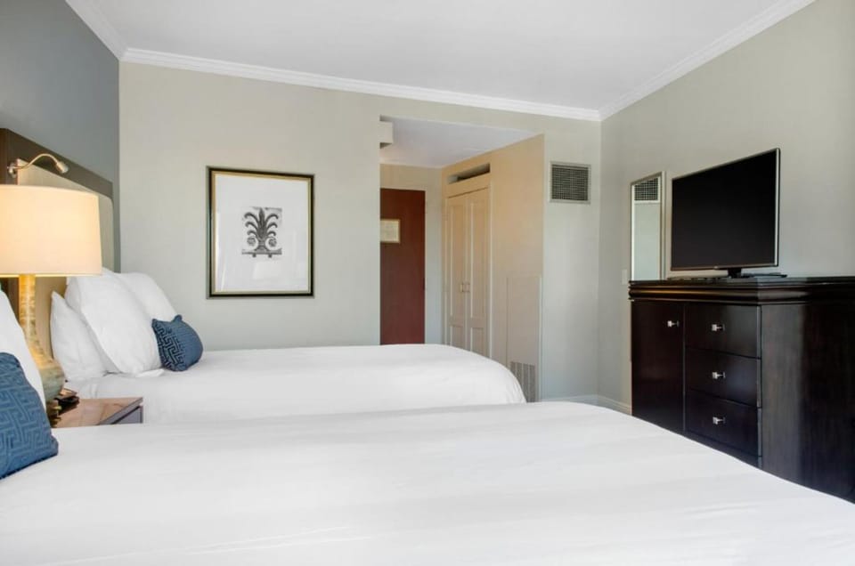 Recharge deeply on plush beds with soothing, hotel-style comfort.