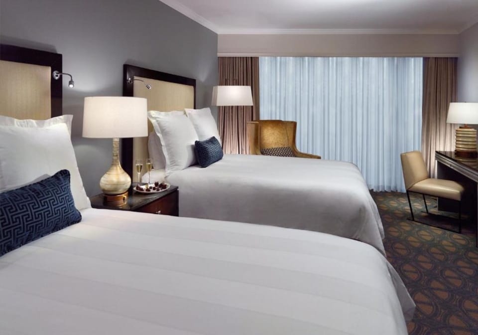 Settle into serene beds with soft, hotel-luxe linens.