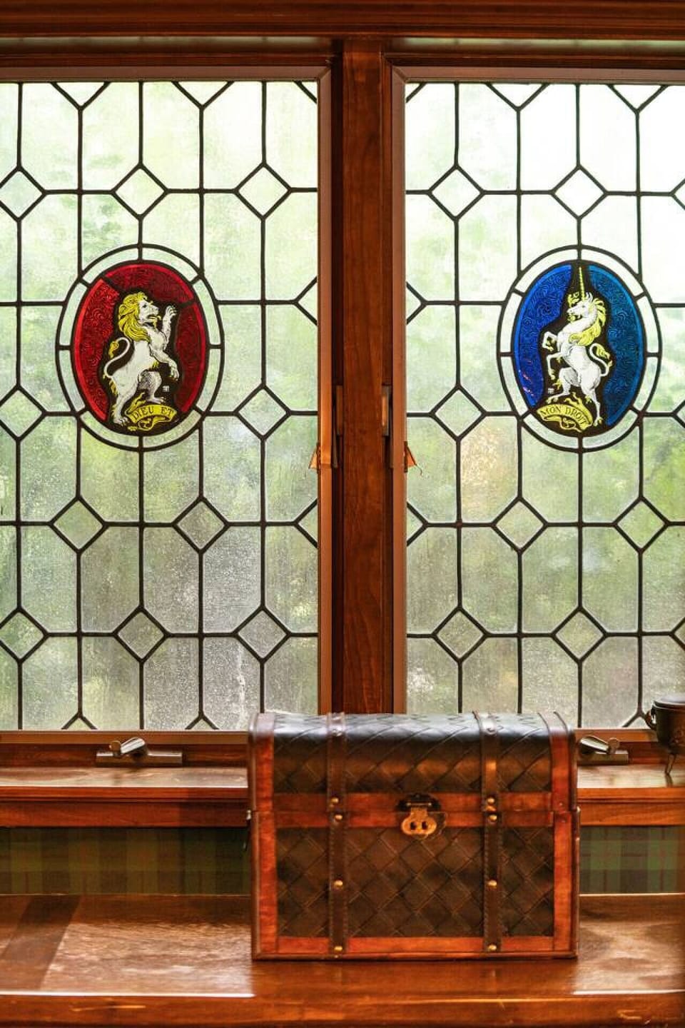 Stained & beveled glass in the Library give it that old world feeling.