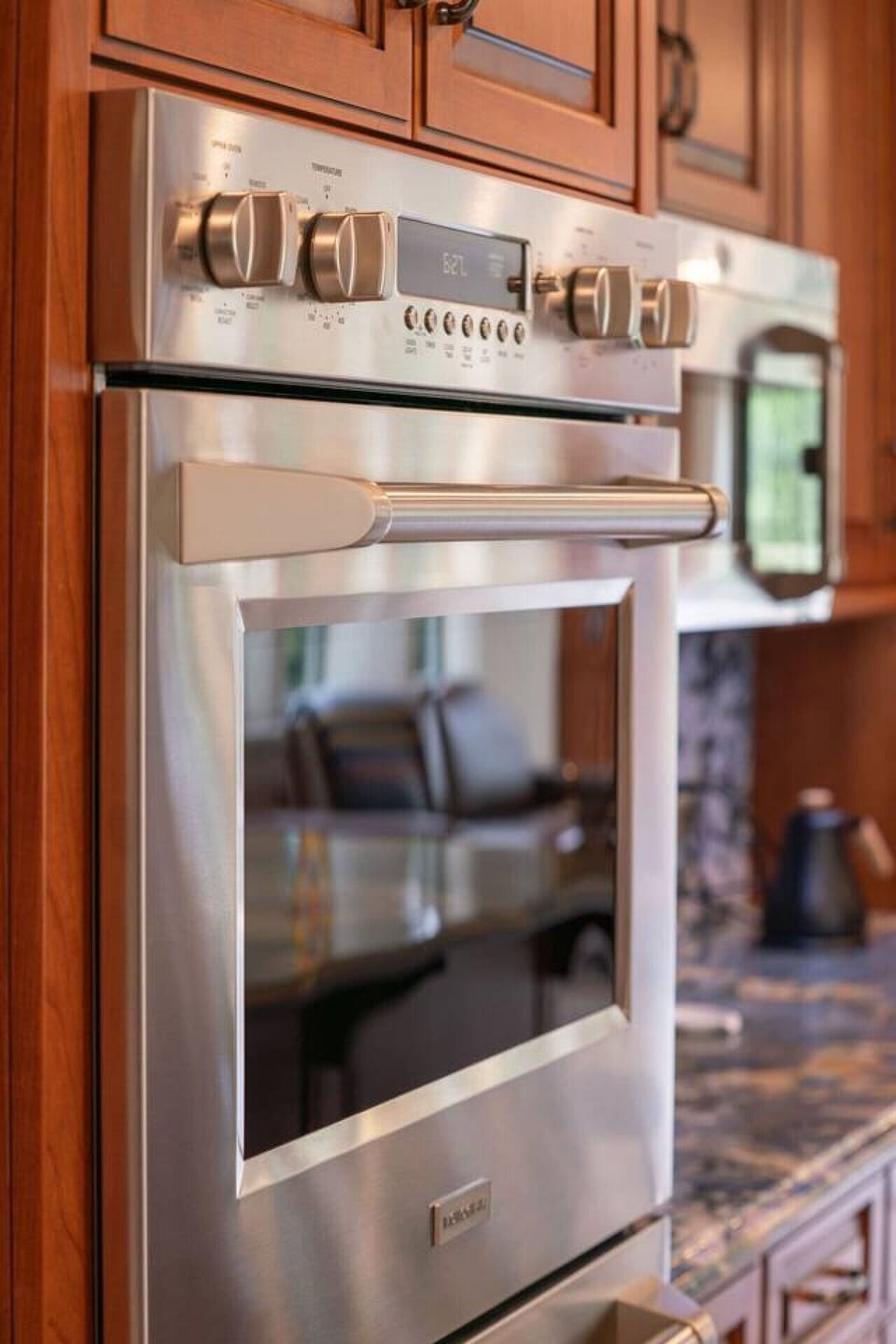 There are 2 wall ovens and a third oven in the range.