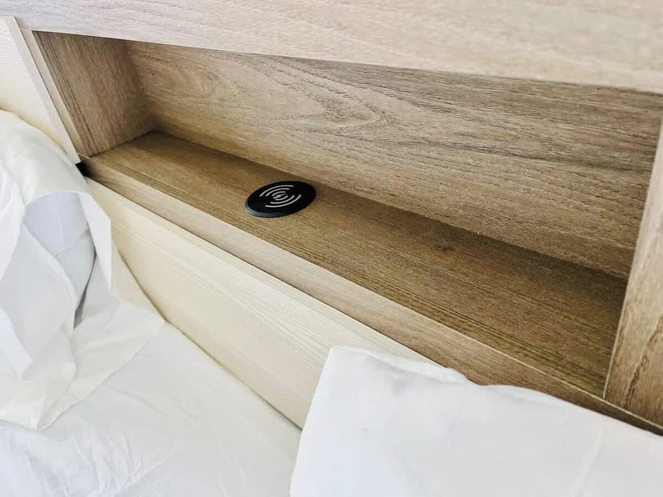 Wireless Phone Charger built into the king bed