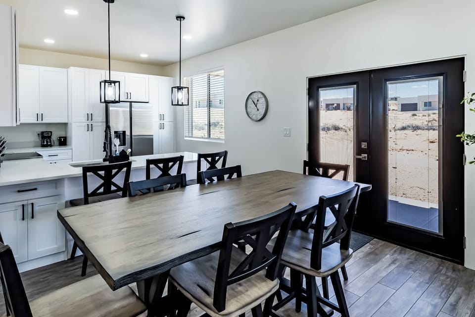 Dining table with seating for 6 plus 3 more seats at the counter.