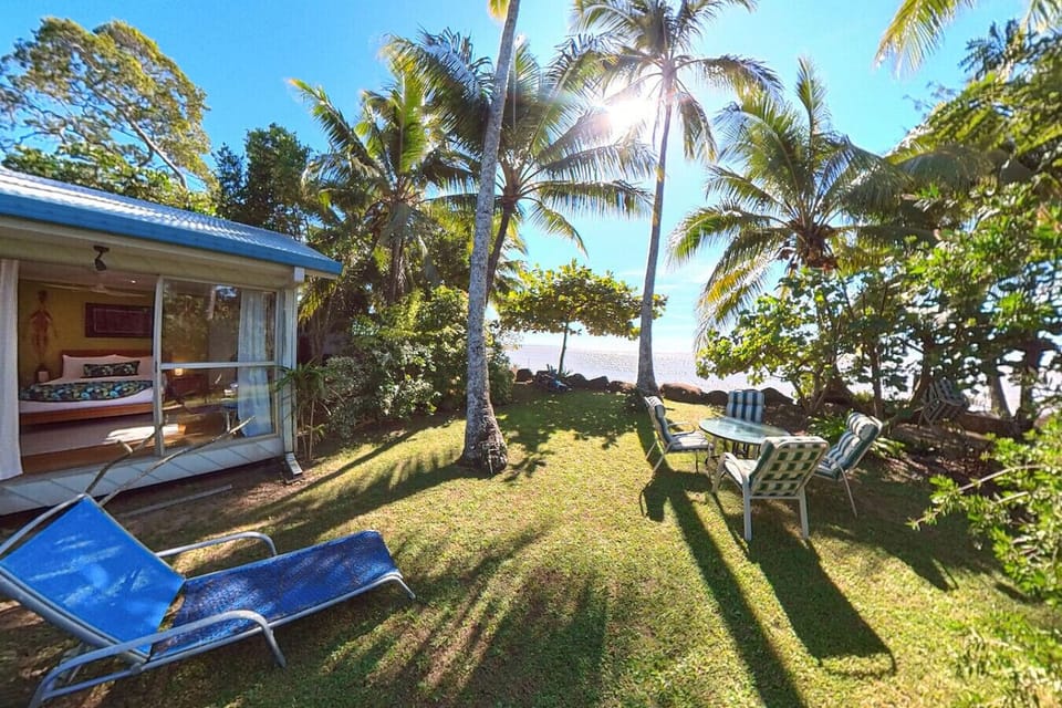 This backyard boasts stunning water views and ample space to relax, making it a perfect setting for family gatherings or quiet moments by the sea.