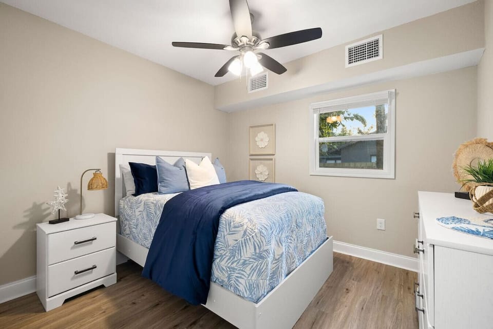 Charming bedroom with a raised full bed—perfect for a restful night`s sleep and cozy mornings.