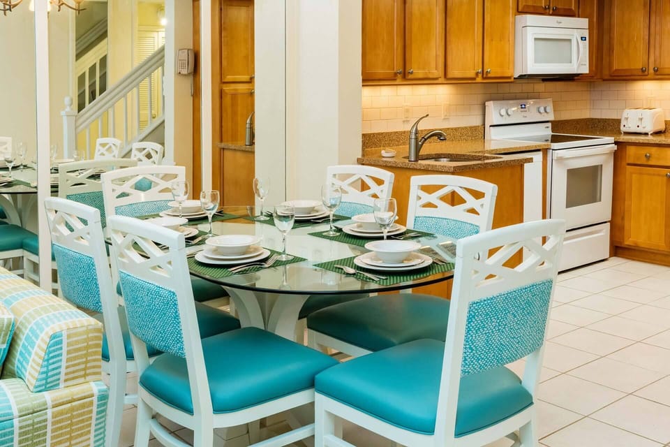 Separate dining area with large table.