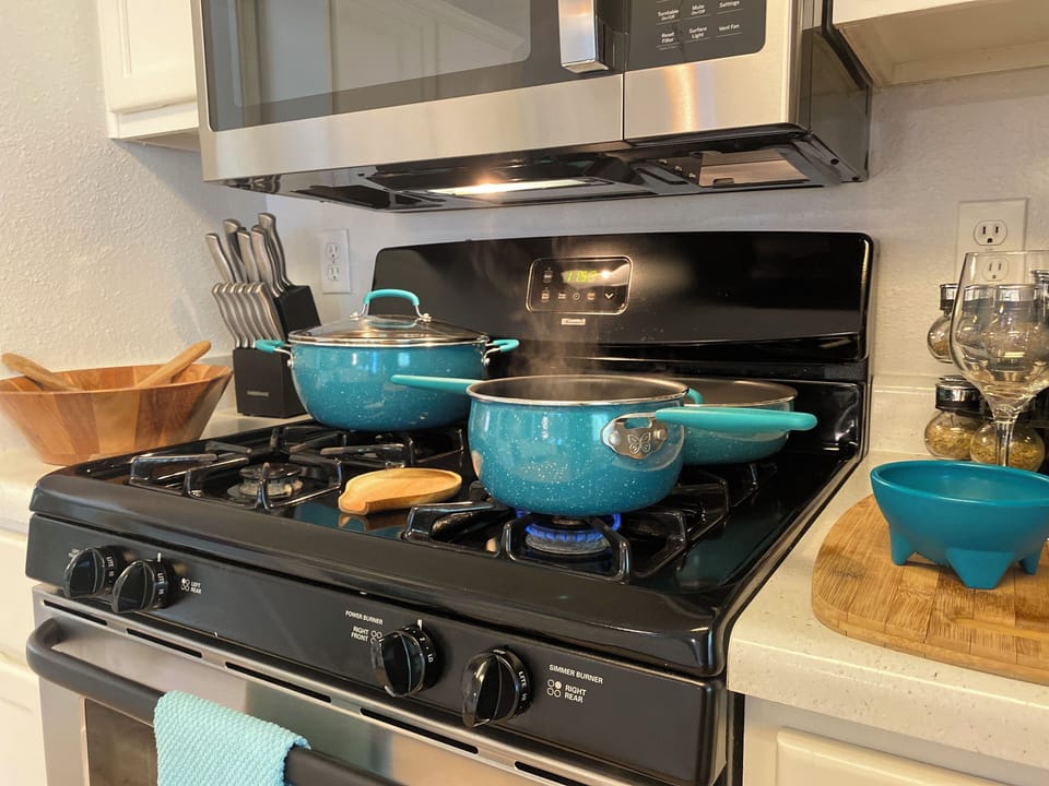 New cookware, tools for food prep, spices and wine glasses all ready for you.