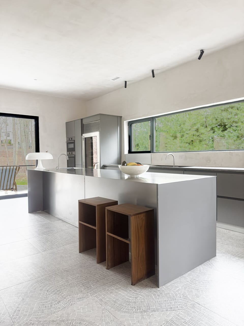 Chef’s Kitchen with European Appliances & Stainless Steel Counters