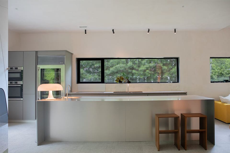 Chef’s Kitchen with European Appliances & Stainless Steel CounterTop
