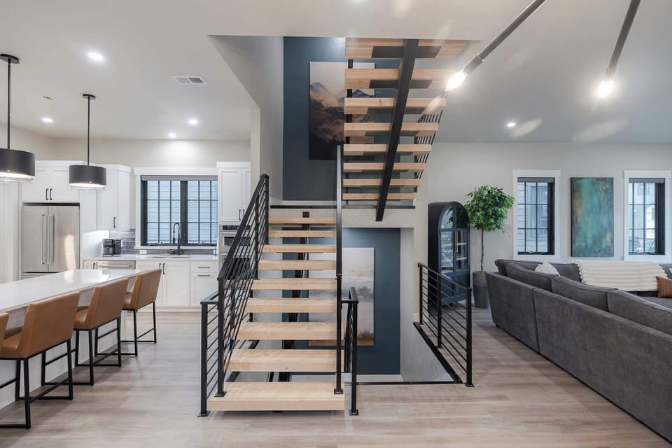 - Step into this stunning home where modern design and comfort flow seamlessly between the kitchen, dining, and living areas. It's an inviting space crafted for connection and memorable moments.