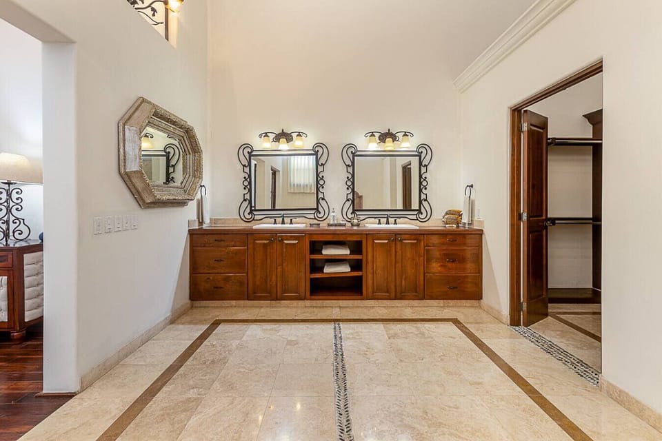 Double vanity, and walk-in closet.