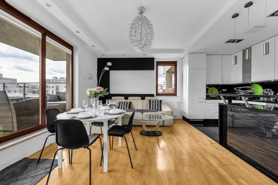 Contemporary Living Room With Dining Area | Book Now With RENTUJEMY