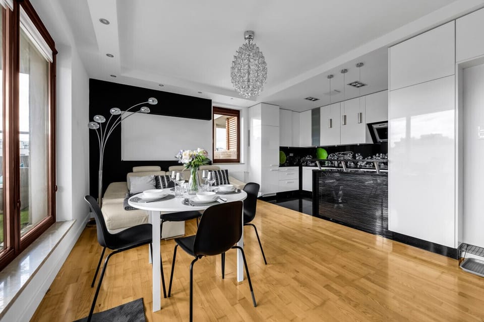Contemporary Living Room With Dining Area | Book Now With RENTUJEMY