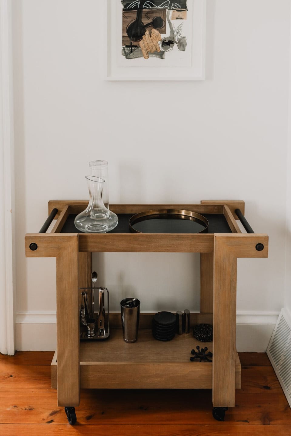 Stylish sideboard with drinkware and accessories.