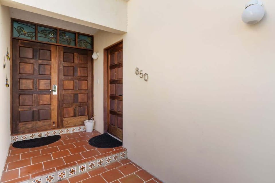 Our elegant doorway features two beautifully crafted doors, designed to enhance any entryway with sophistication.