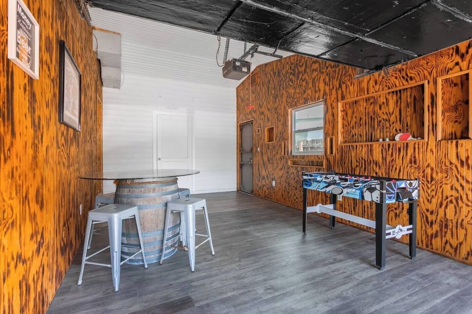 Games room with foosball and seating