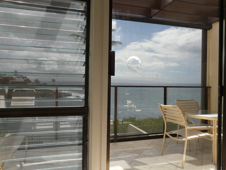 Retractable Sun Shade allows extended enjoyment of the lanai