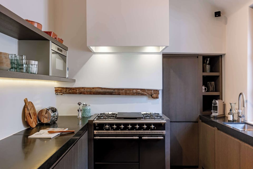 Bright kitchen view showing the harmony of function and style.