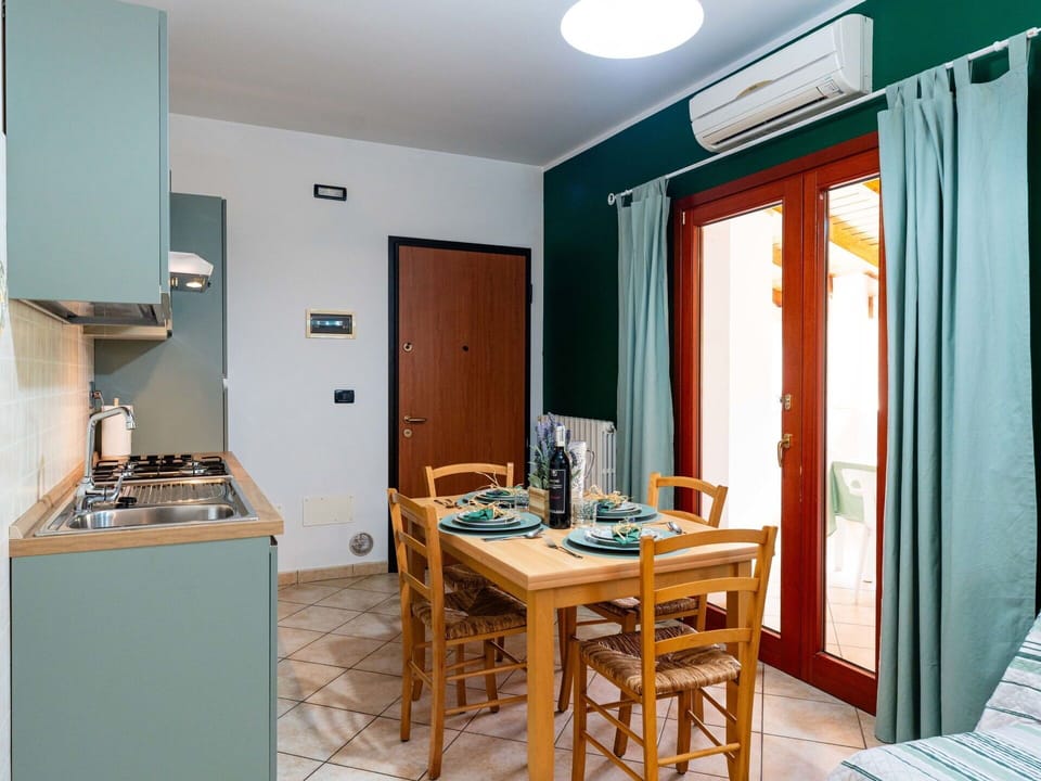 Interior Design, Room, Apartment, Wood Stain, Hardwood, Chair, Houseplant, Kitchen & Dining Room Table