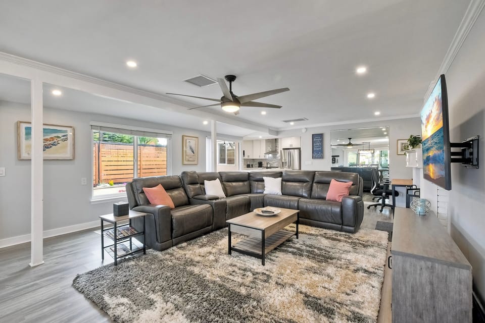 Spacious living room with reclining sofas