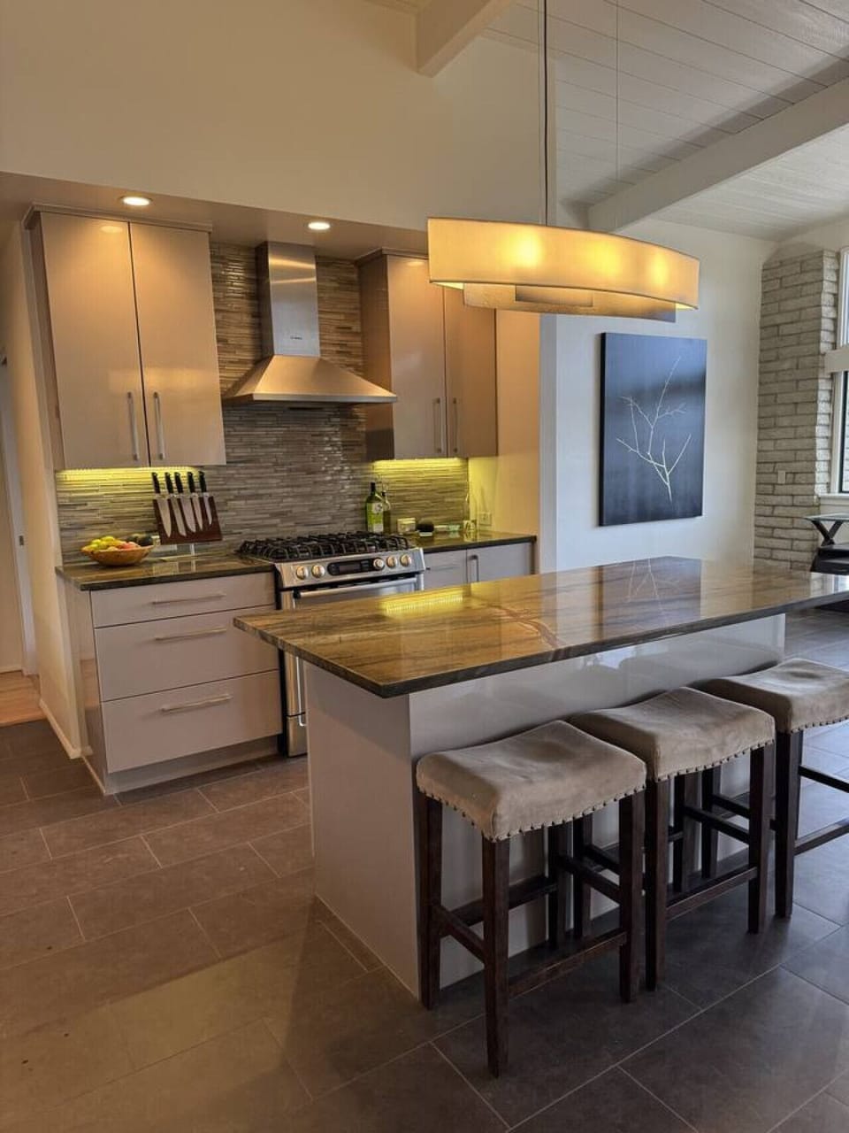 Spacious, Fully-Equipped Kitchen with a Central Island for Prep & Dining