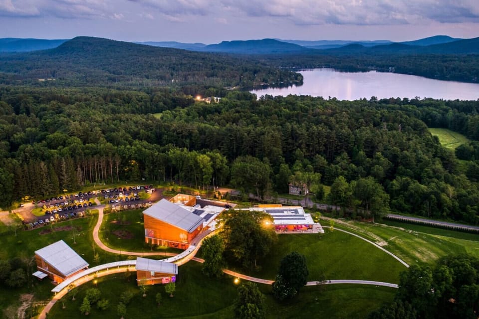 Scenic aerial view showcasing the beautiful lakefront location and lush surroundings.