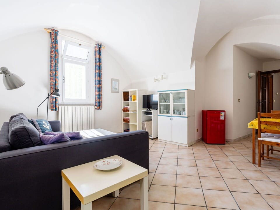 Furniture, Interior Design, Flooring, Floor, Ceiling, Apartment, Room, Couch, Table, Living Room