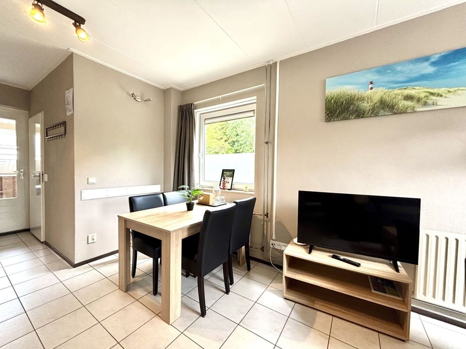 Furniture, Interior Design, Flooring, Floor, Room, Home, Apartment, Television, Ceiling