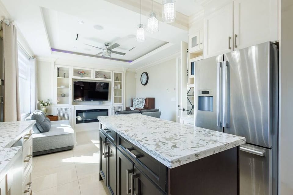 Stay in touch with the living room crowd, even when preparing tasty meals in the kitchen.