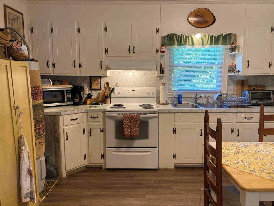 All the cooking and eating utensils your heart could desire, even a rolling pin!