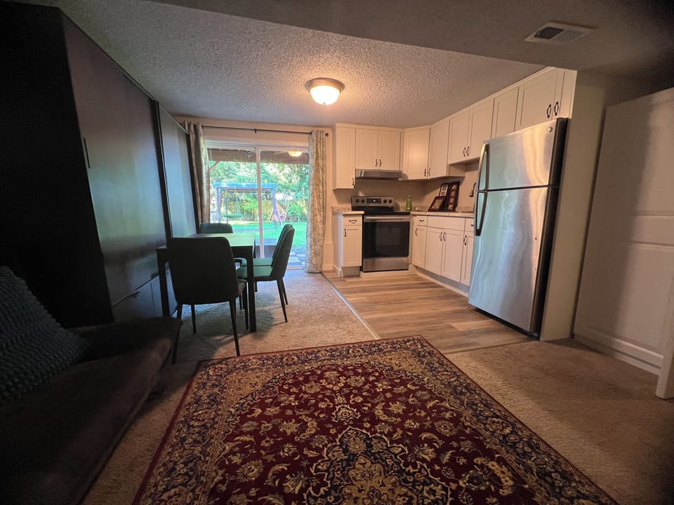 Dining, kitchen and living room area in the basement suite.
