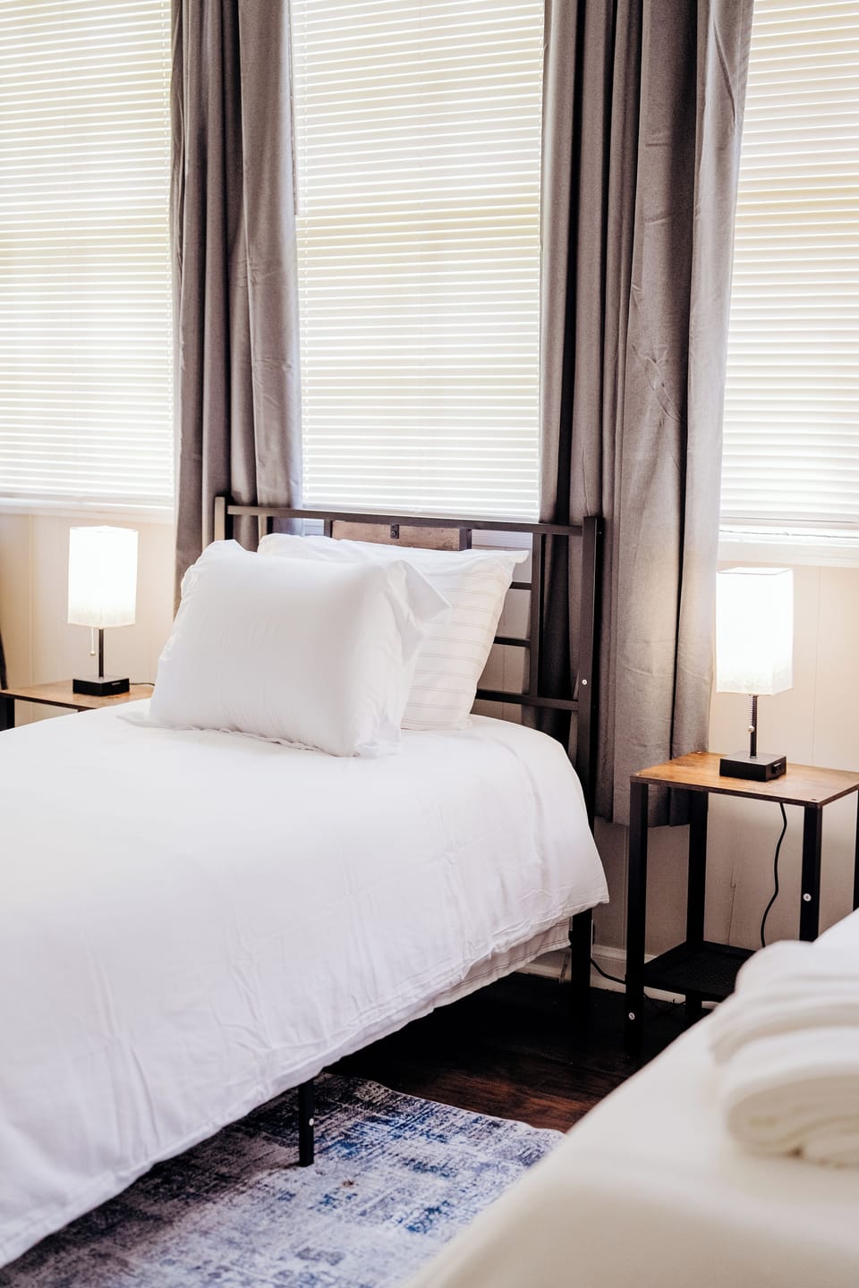 Bright and inviting space featuring two comfortable single beds