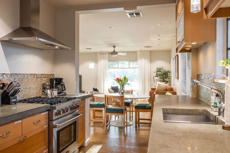 Cook with ease in this spacious kitchen featuring plenty of storage and modern appliances.