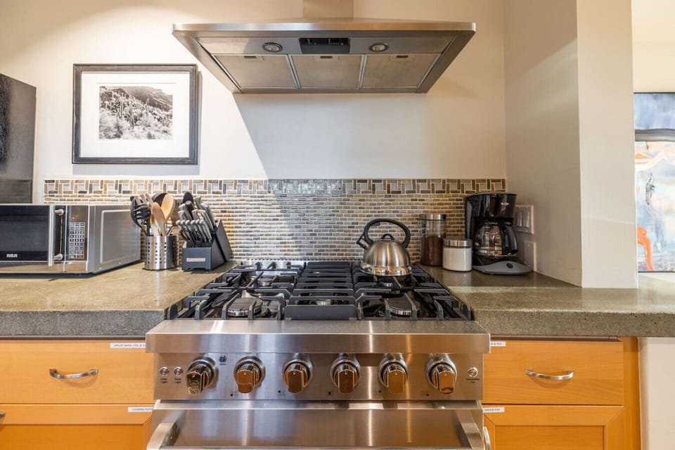 Cook, bake, and entertain with ease in this spacious, fully equipped kitchen.
